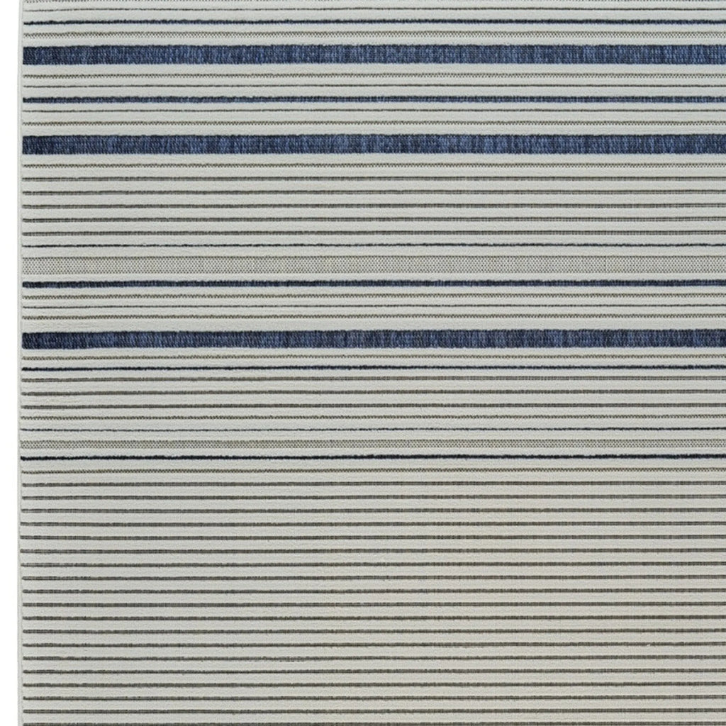 6′ X 9′ Blue and Cream Striped Distressed Indoor Outdoor Area Rug — view 4