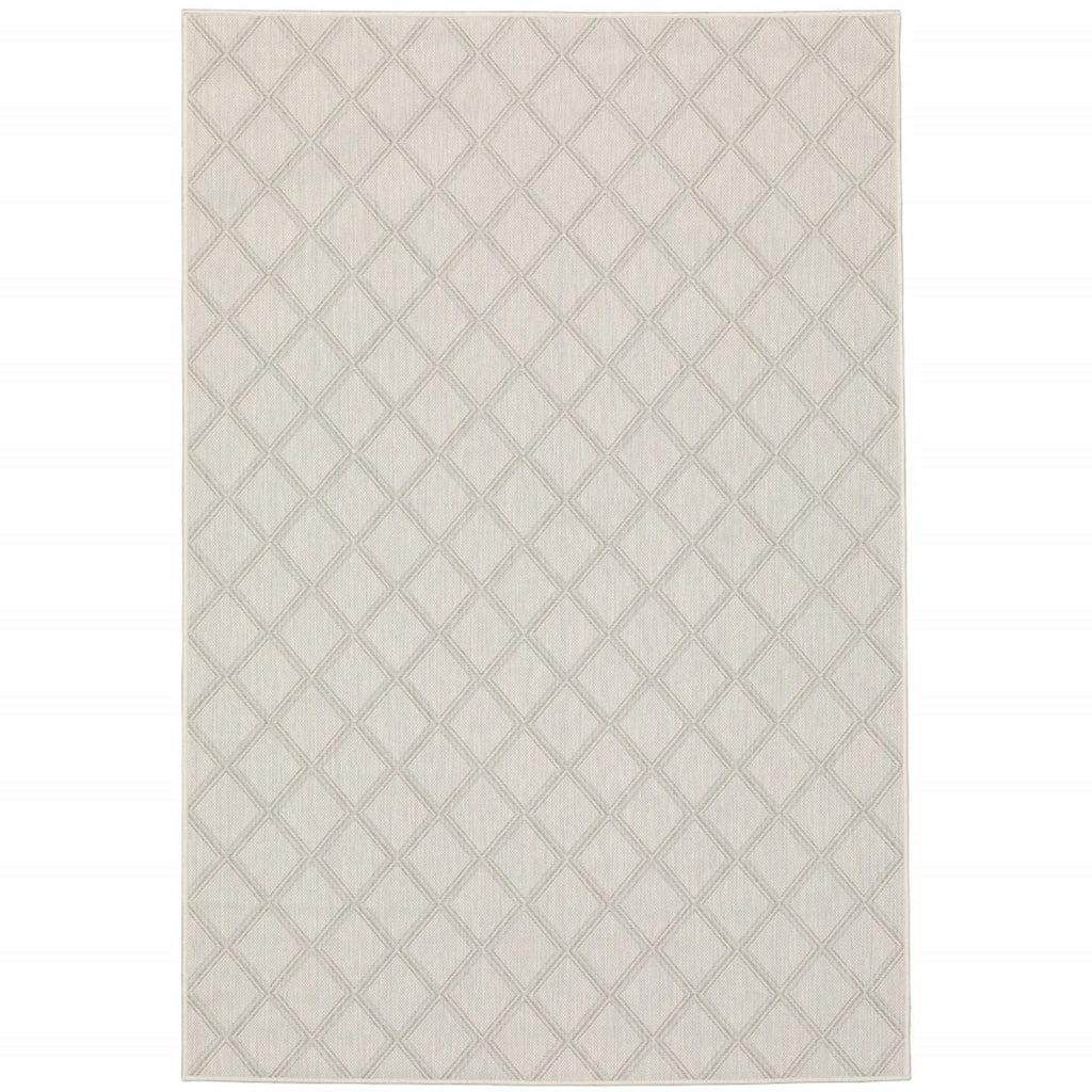 7′ X 9′ Gray and Ivory Geometric Stain Resistant Indoor Outdoor Area Rug