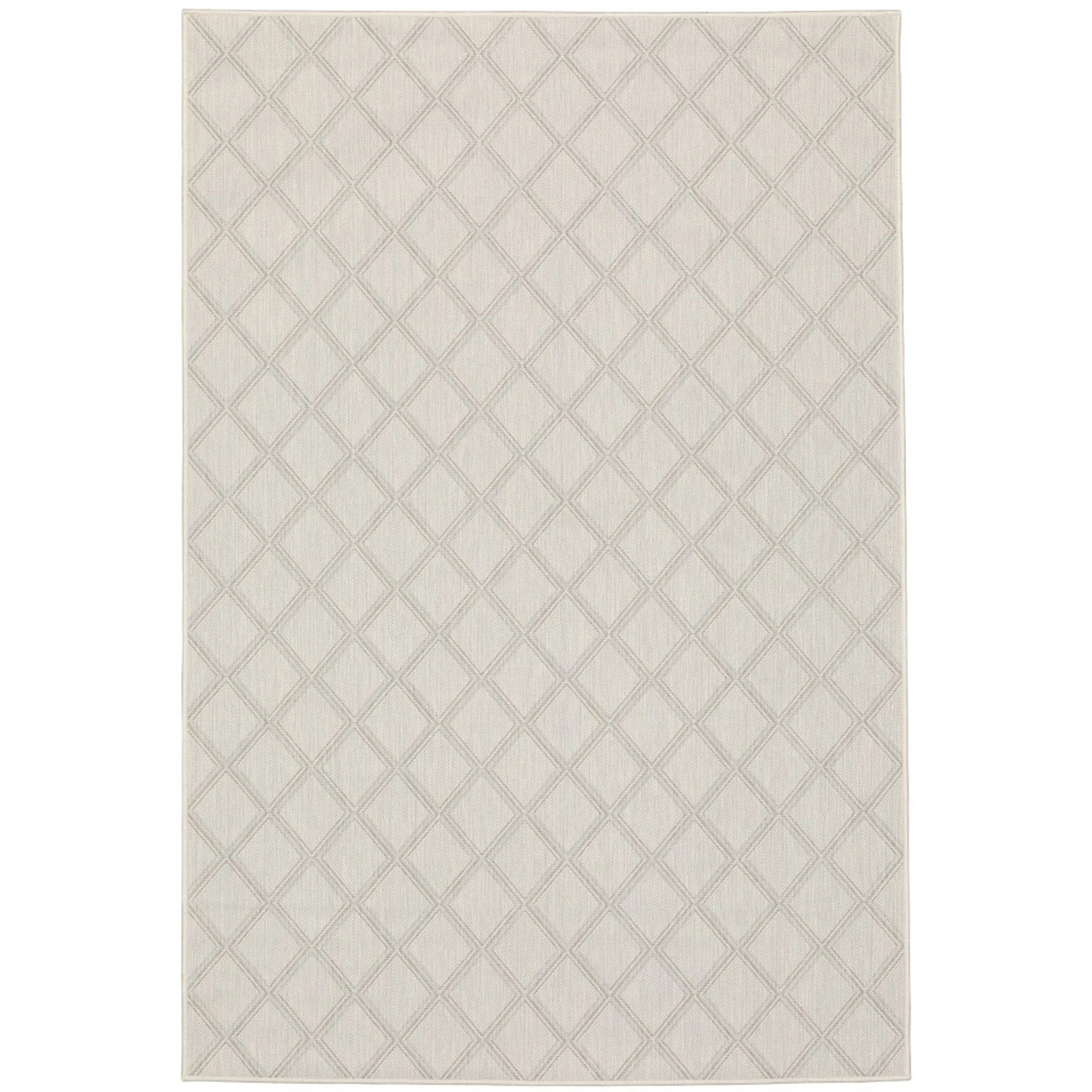 7′ X 9′ Gray and Ivory Geometric Stain Resistant Indoor Outdoor Area Rug