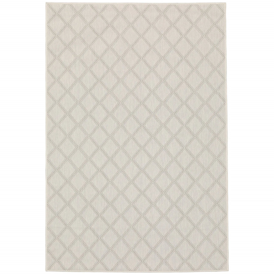 7′ X 9′ Gray and Ivory Geometric Stain Resistant Indoor Outdoor Area Rug