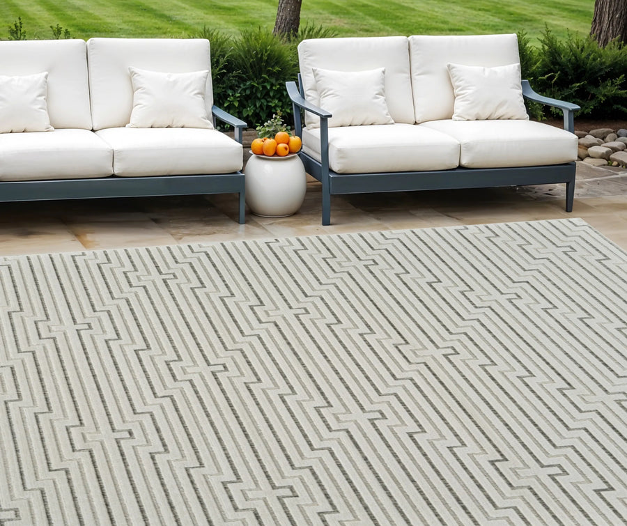 6′ X 9′ Cream and Beige Geometric Distressed Indoor Outdoor Area Rug