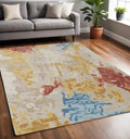 5′ X 8′ Ivory and Blue Wool Abstract Hand Tufted Area Rug