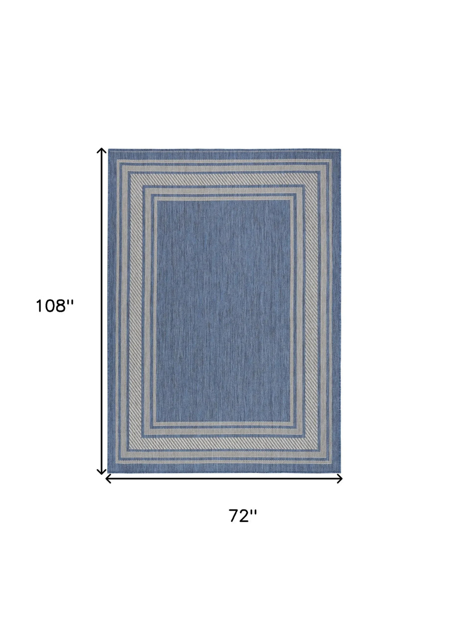 6′ X 9′ Denim Blue And Ivory Geometric Indoor Outdoor Area Rug — view 2