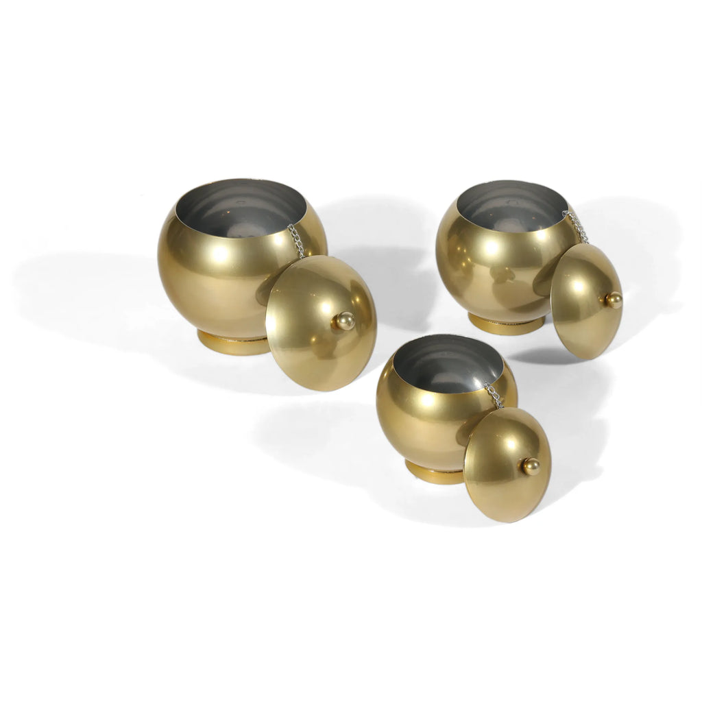 Set of Three Gold Metal Decorative Lidded Canisters — view 3