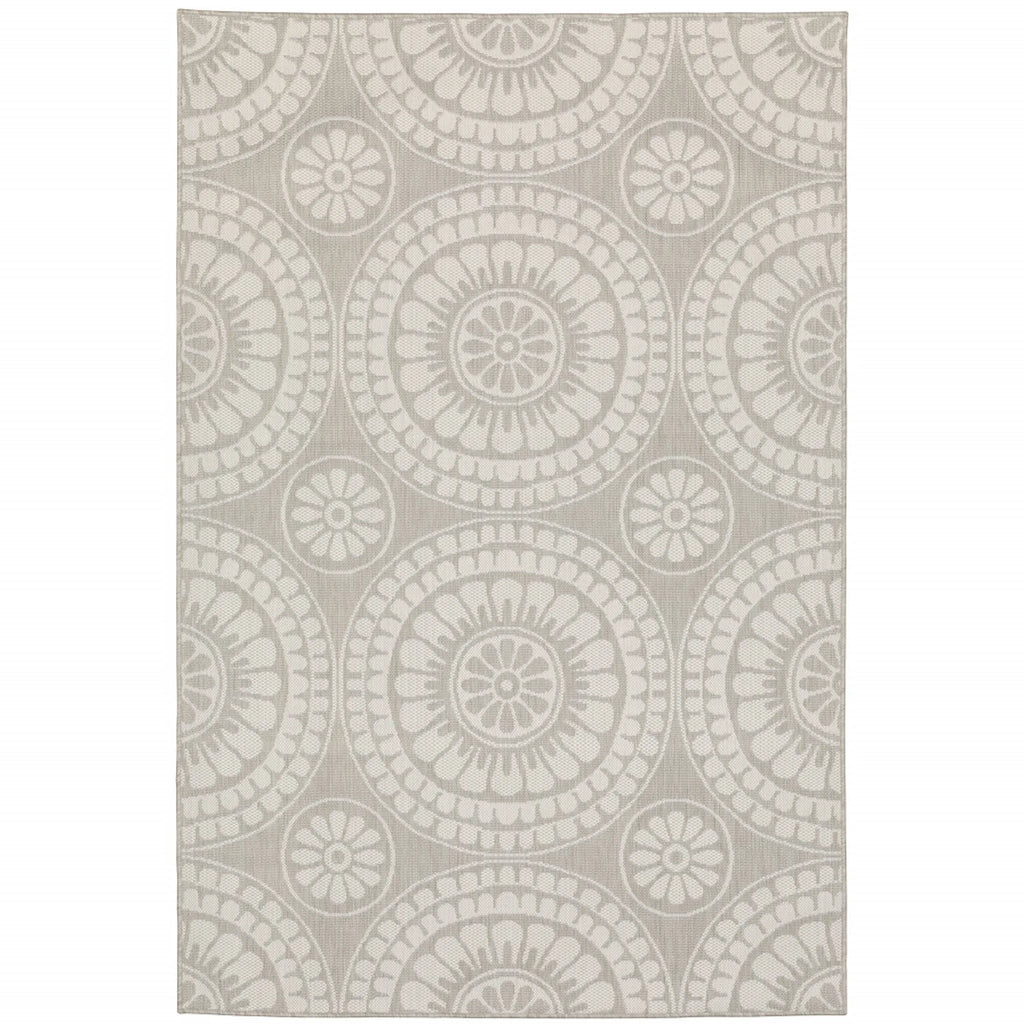 7′ X 9′ Gray and Ivory Geometric Stain Resistant Indoor Outdoor Area Rug