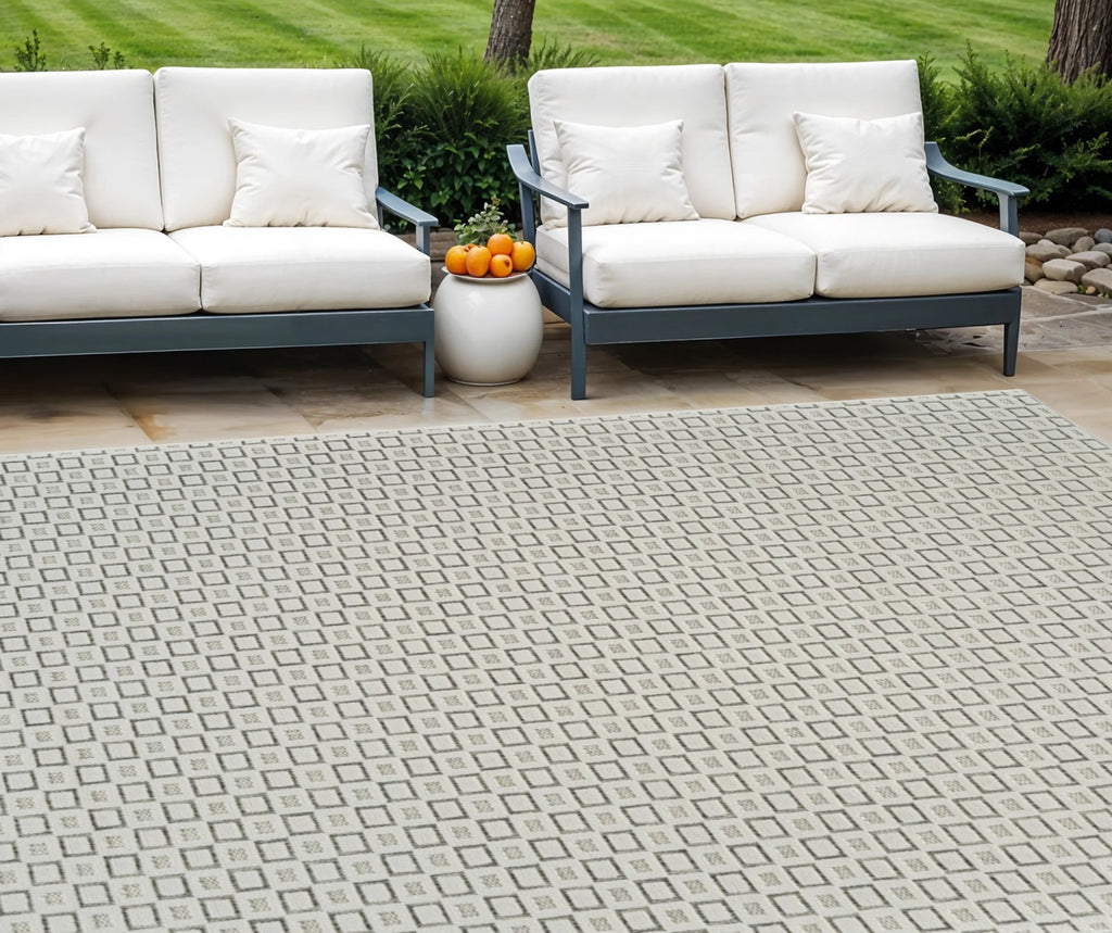 6′ X 9′ Cream and Beige Geometric Distressed Indoor Outdoor Area Rug