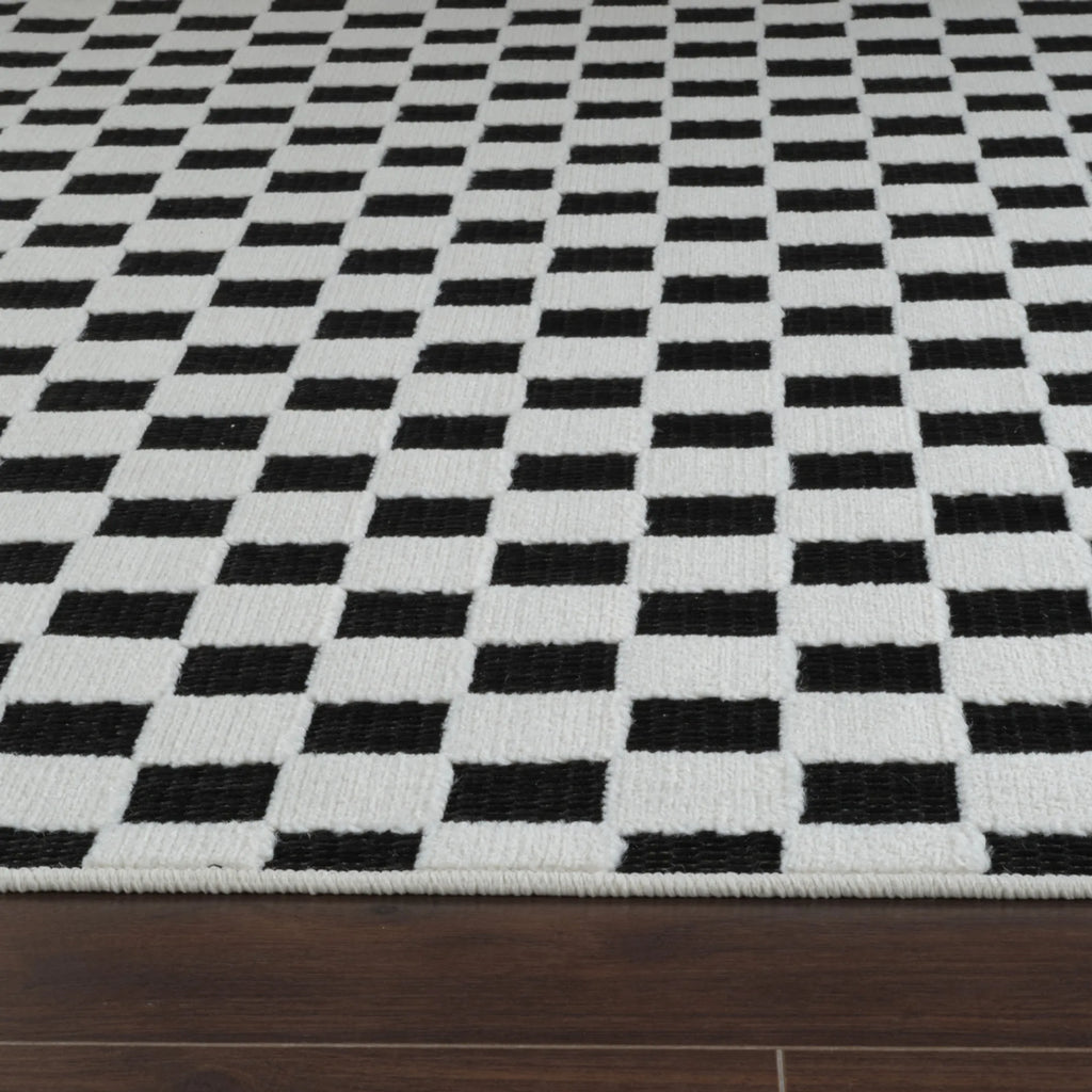6′ X 9′ Black and White Geometric Distressed Indoor Outdoor Area Rug — view 4