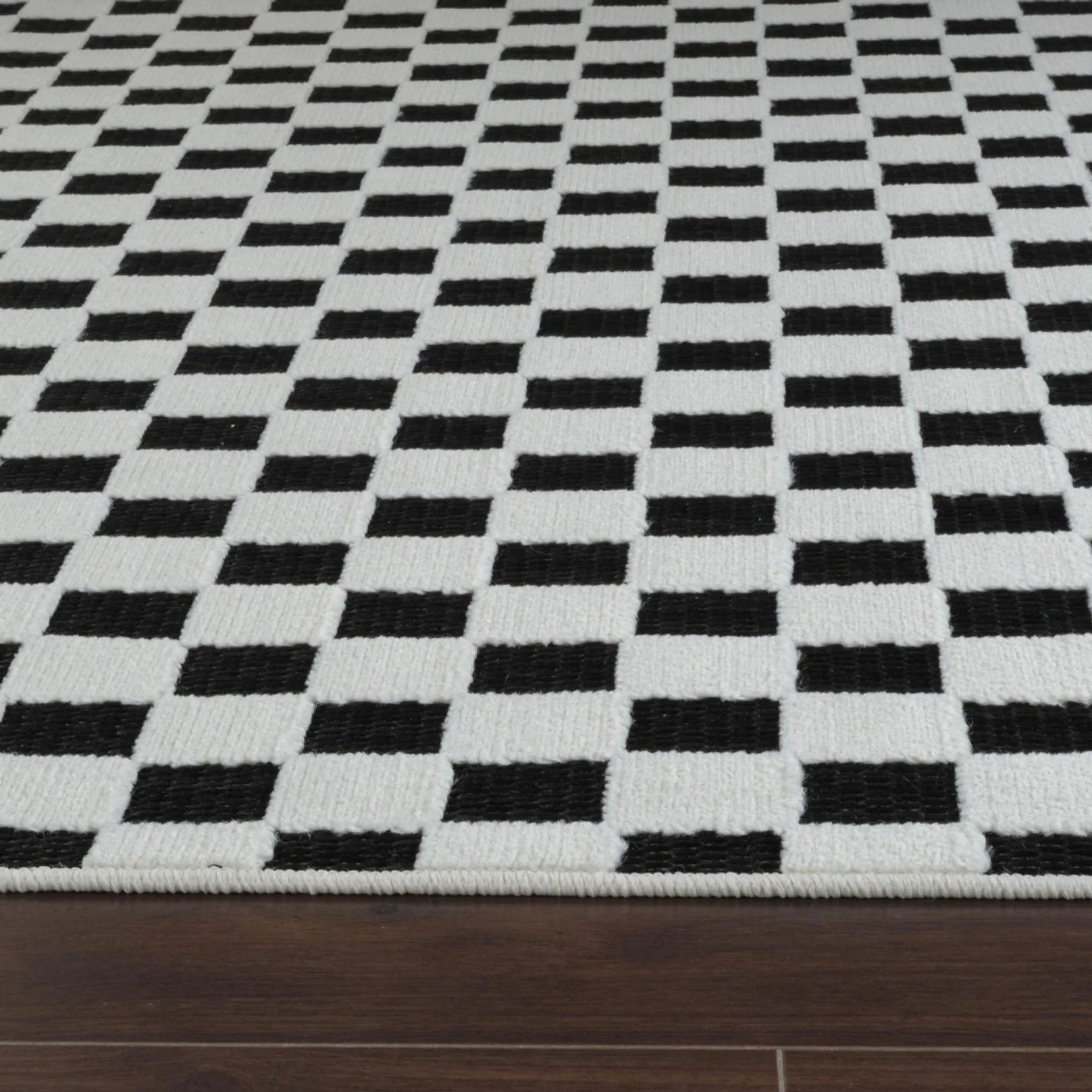 6′ X 9′ Black and White Geometric Distressed Indoor Outdoor Area Rug — view 4