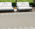 6′ X 9′ Beige and Brown Geometric Distressed Indoor Outdoor Area Rug