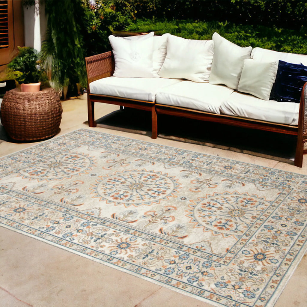 9′ X 12′ Blue and Orange Medallion Stain Resistant Indoor Outdoor Area Rug